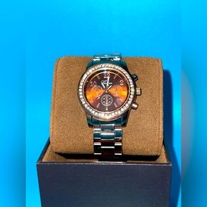 Rich coffee colored watch with diamond halo